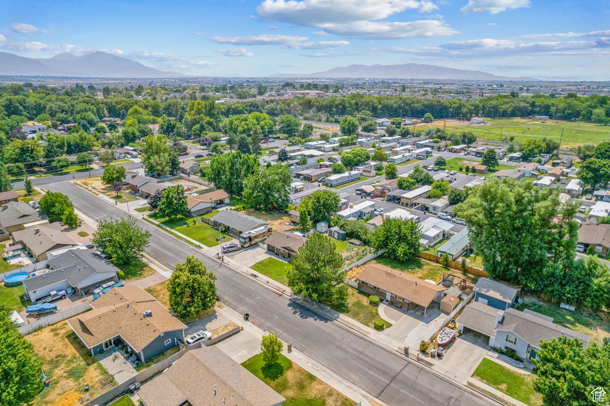 Aerial view of residential area with mountains