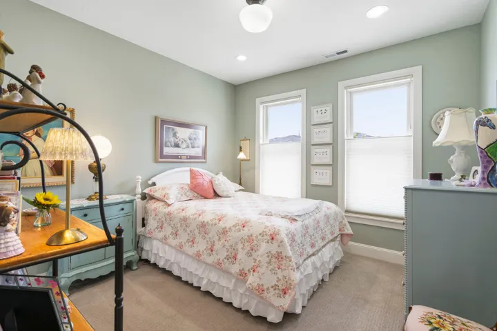 Bedroom featuring light colored carpet and recessed lighting