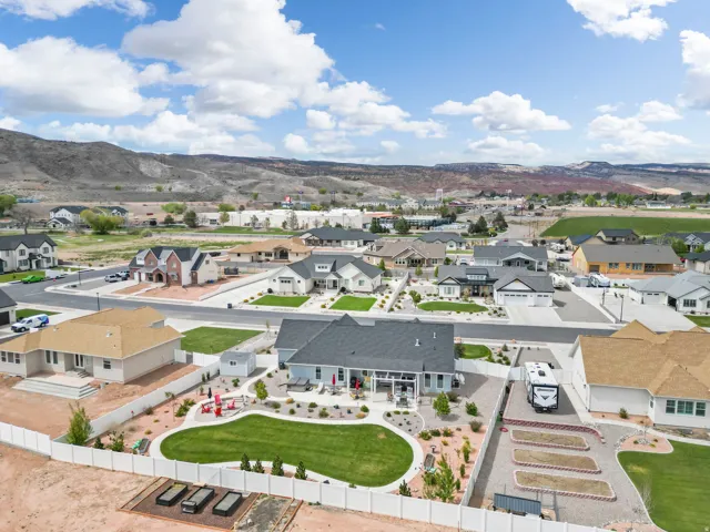 Aerial view of residential area featuring mountains