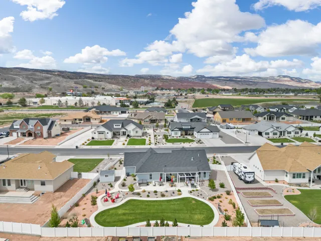 Aerial view of residential area with a mountainous background