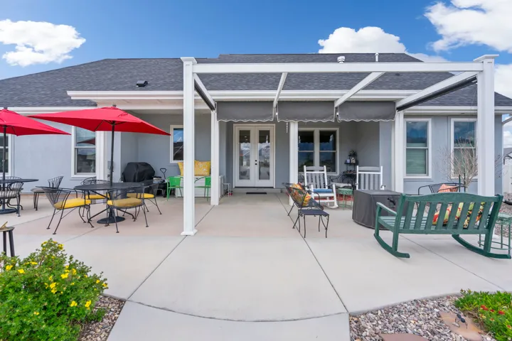 View of patio / terrace with french doors, outdoor dining space, and area for grilling