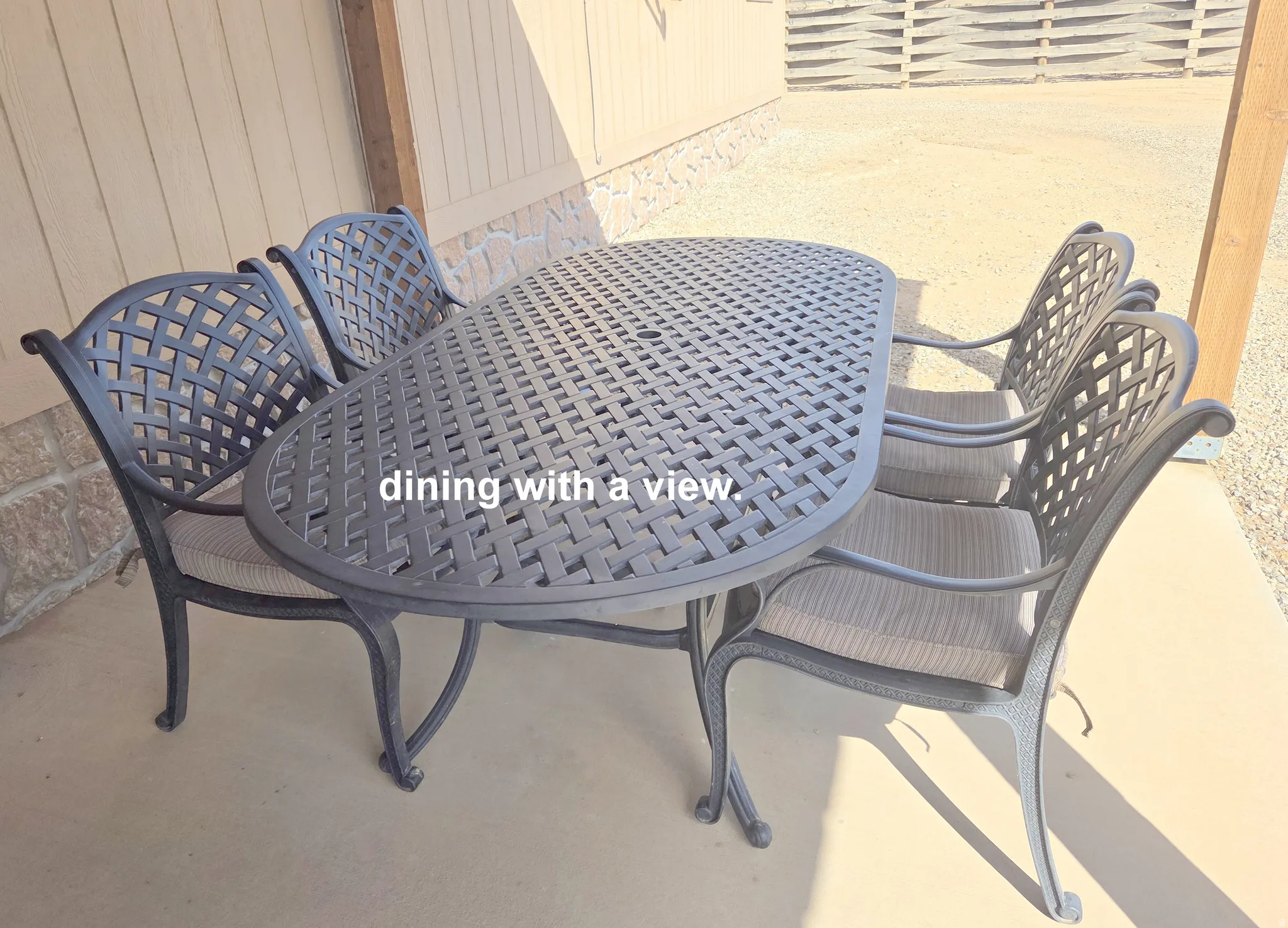 Shaded patio with outdoor dining.