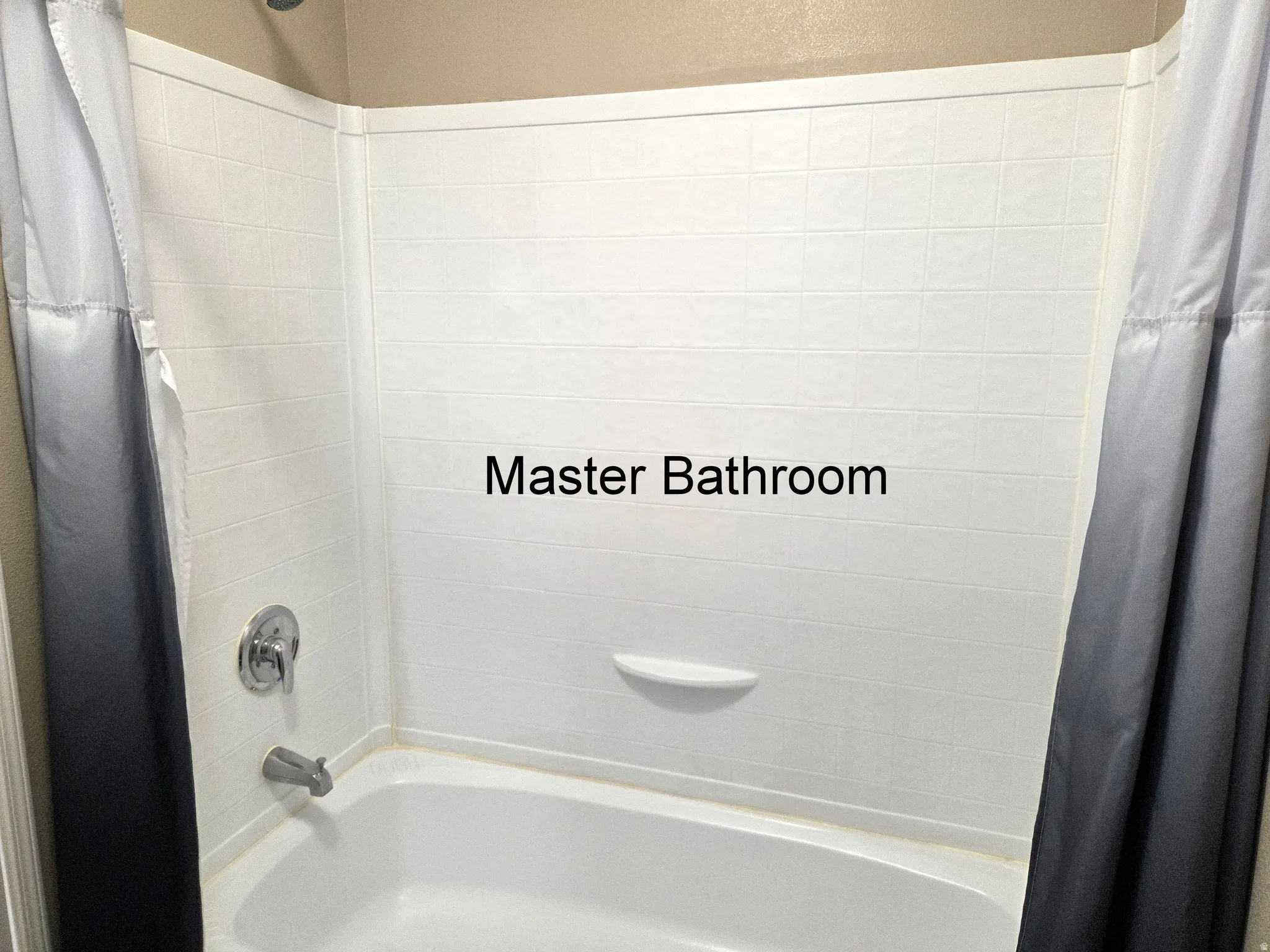 Bathroom featuring shower / tub combo