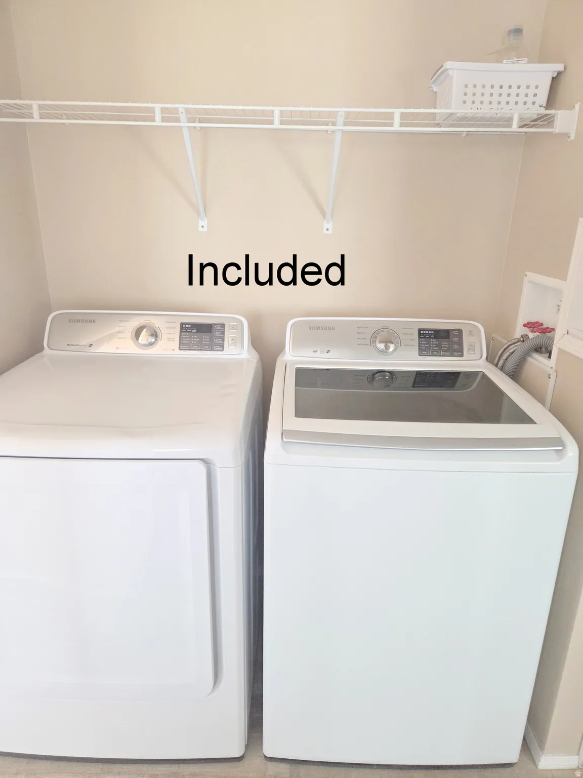 Laundry area featuring washing machine and dryer