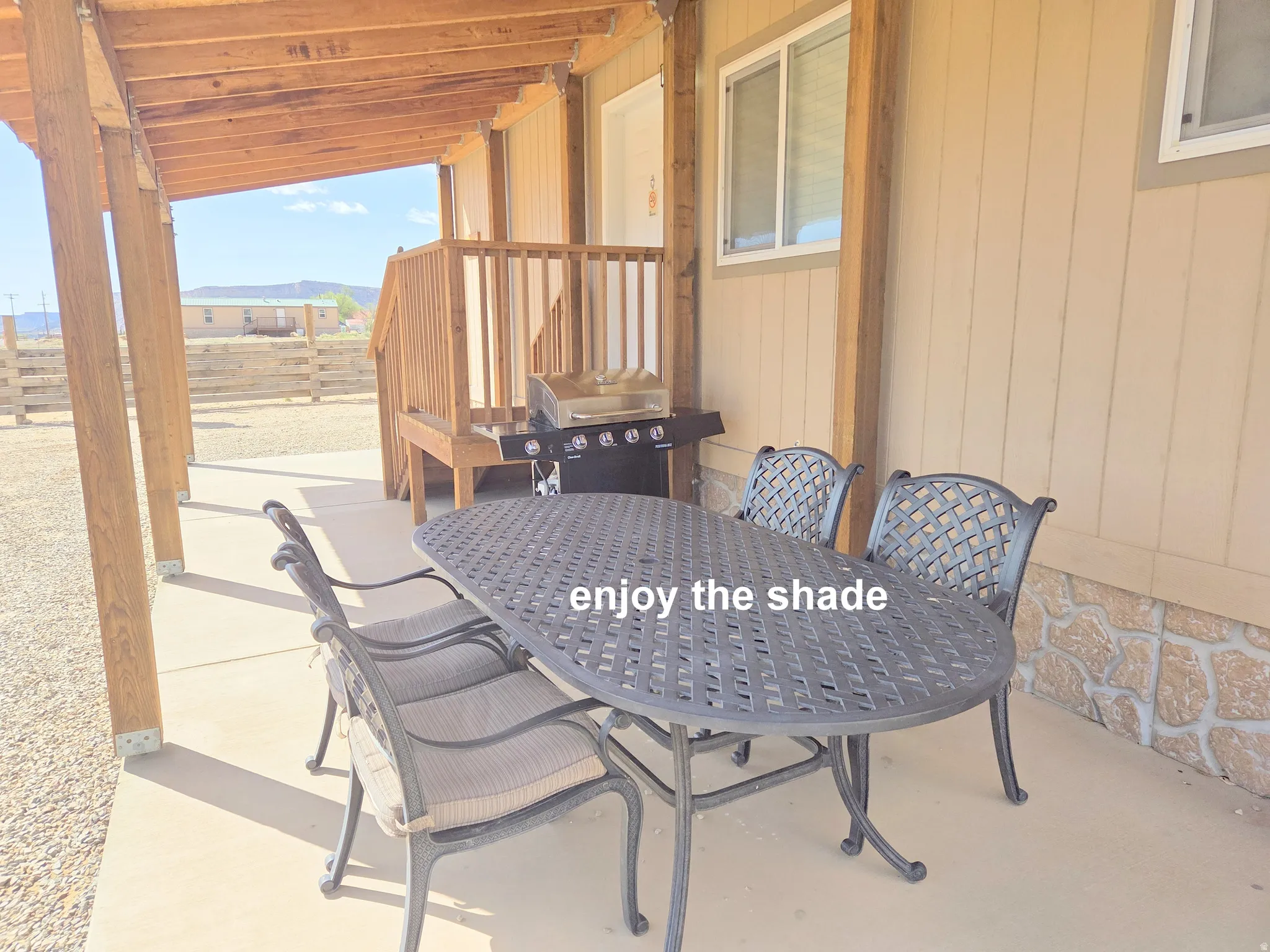 View of patio / terrace featuring outdoor dining space, area for grilling, and a La Sal mountain view.