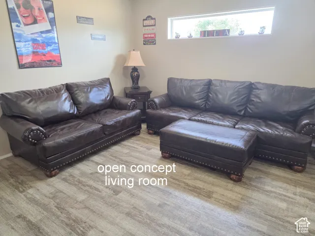 View of living room with comfortable seating.