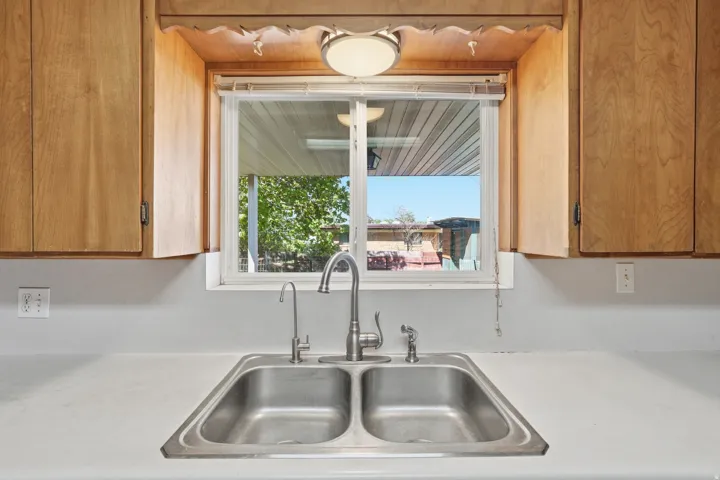 Kitchen featuring light countertops