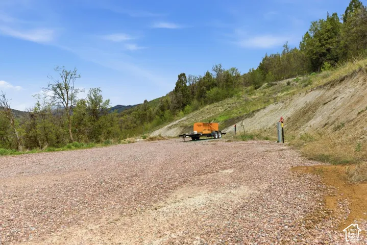 View of road featuring a mountain view- with more rv hookups