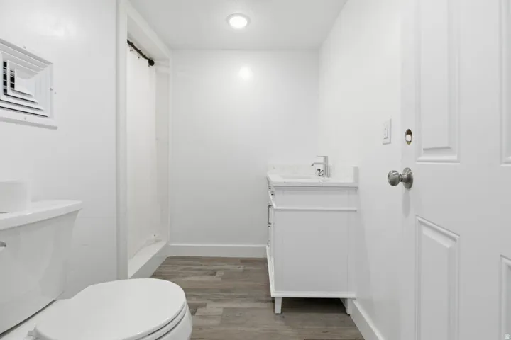 Bathroom with vanity and light wood-style flooring