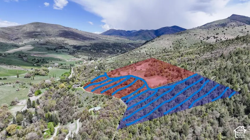 Property could be split something like this to just buy the undeveleoped land if buyer wanted this instead of whole parcel.  It would follow Bonneville Road that goes halfway thru the red parcel.  Approximately 10+- acres- This is a visual only not a surv