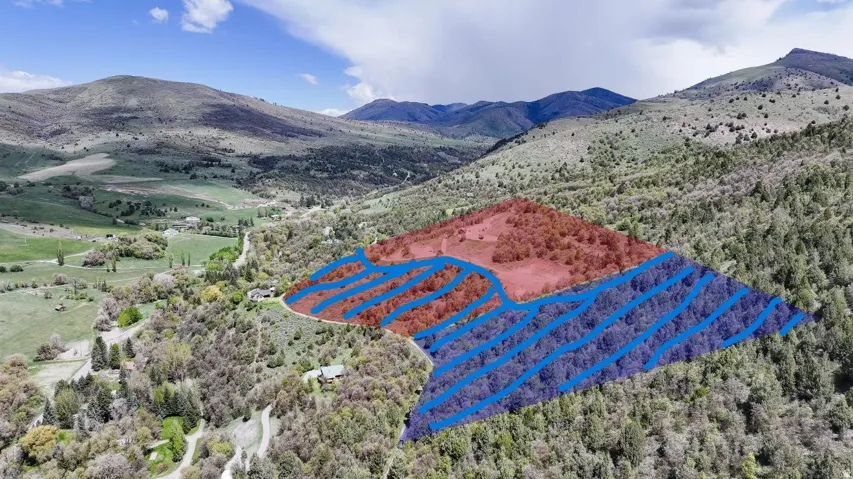 Property could be split something like this to just buy the undeveleoped land if buyer wanted this instead of whole parcel.  It would follow Bonneville Road that goes halfway thru the red parcel.  Approximately 10+- acres- This is a visual only not a surv