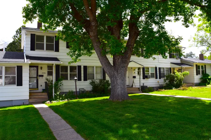 View of front of property featuring a front yard