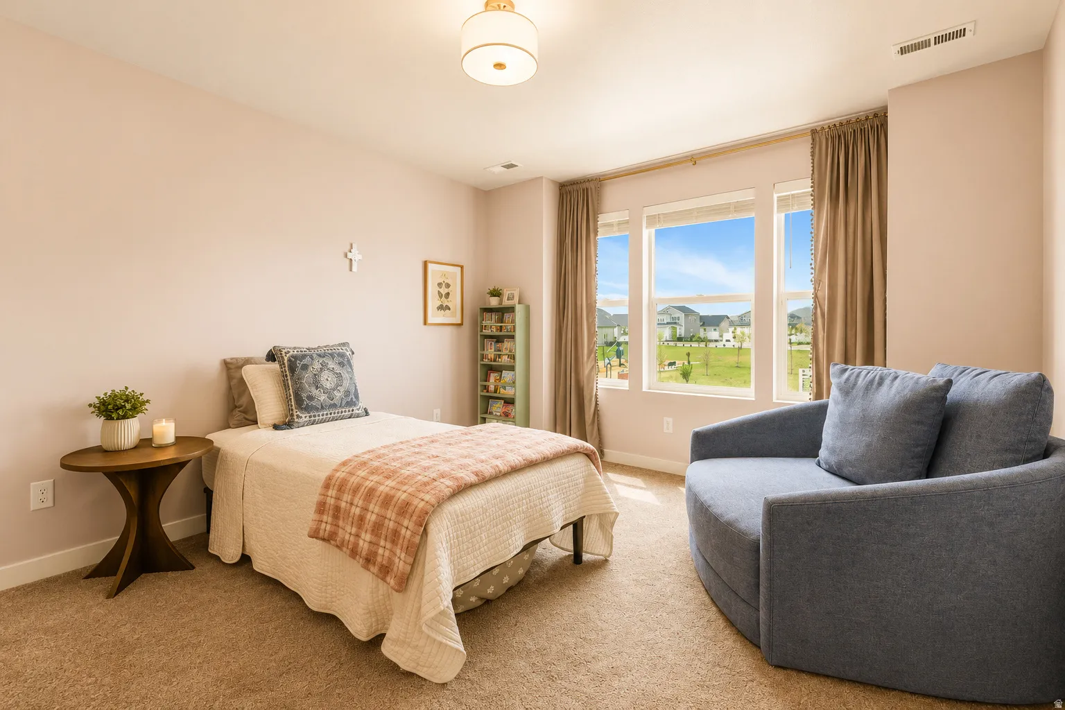 Room with three large windows, carpet flooring, light-colored walls, and a semi-flush mount ceiling light