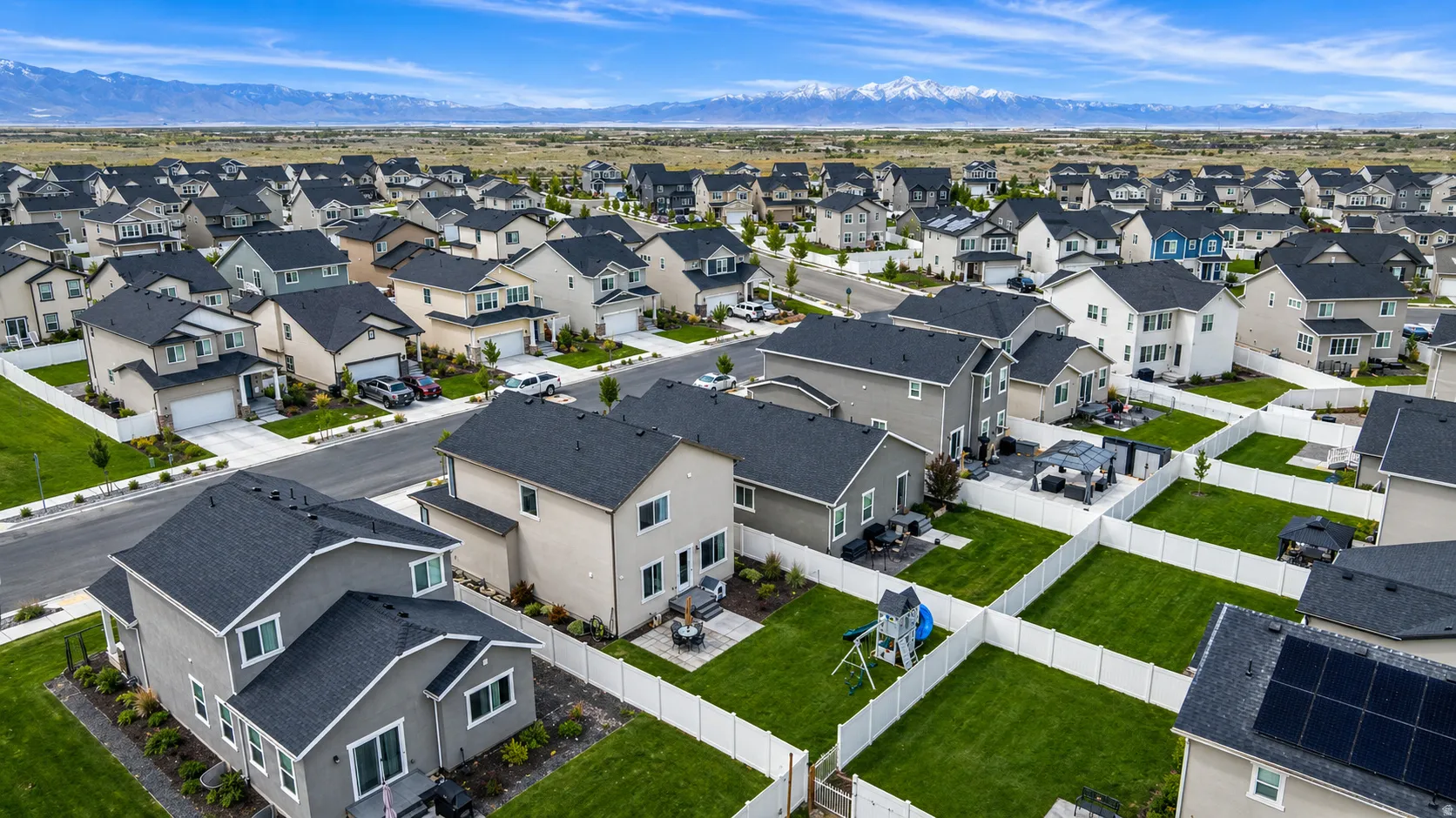 Aerial view of residential area with a mountain backdrop