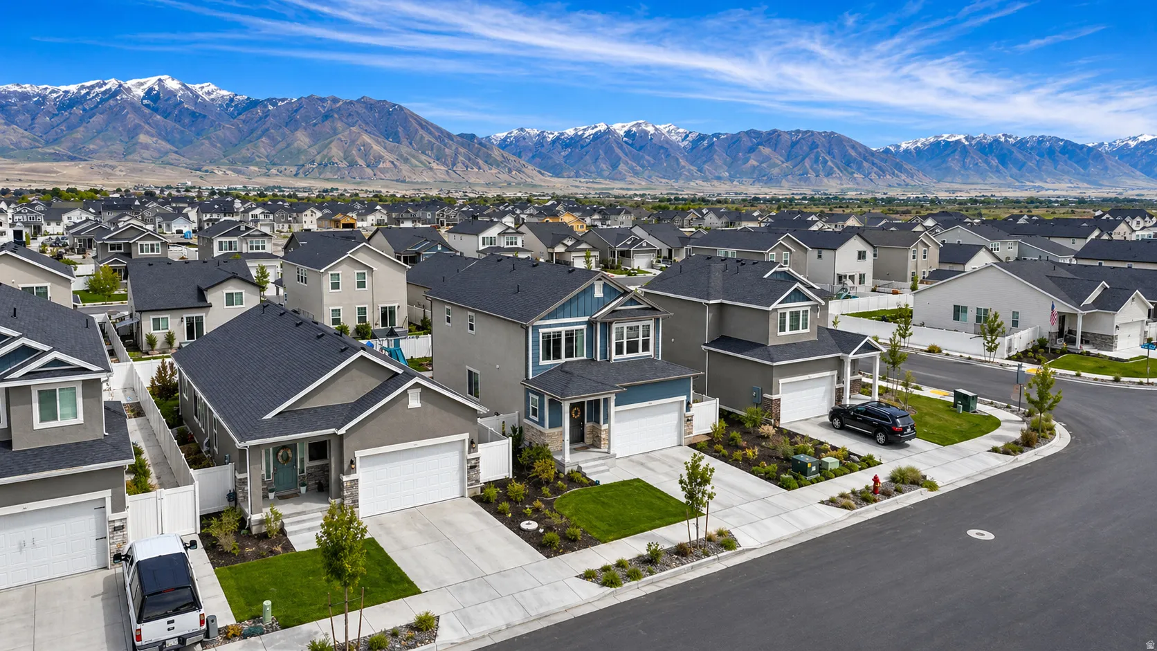 Aerial perspective of suburban area with mountains