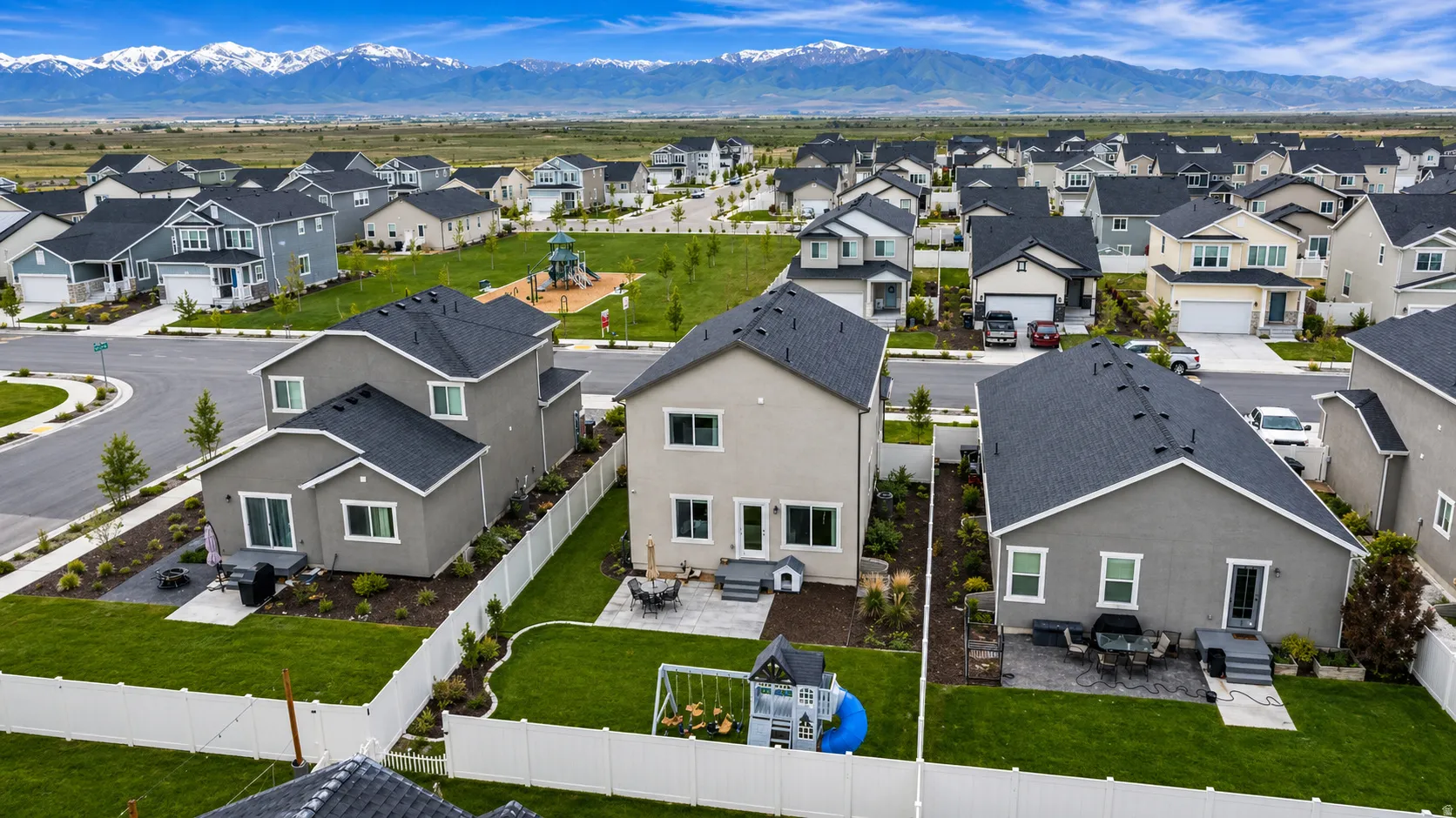 Aerial perspective of suburban area featuring mountains