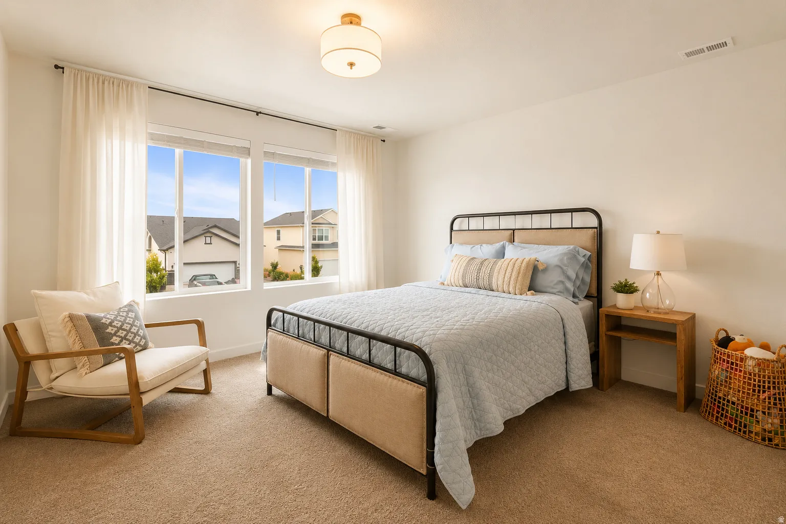 Room featuring large windows with white trim, light-colored walls, and carpet flooring