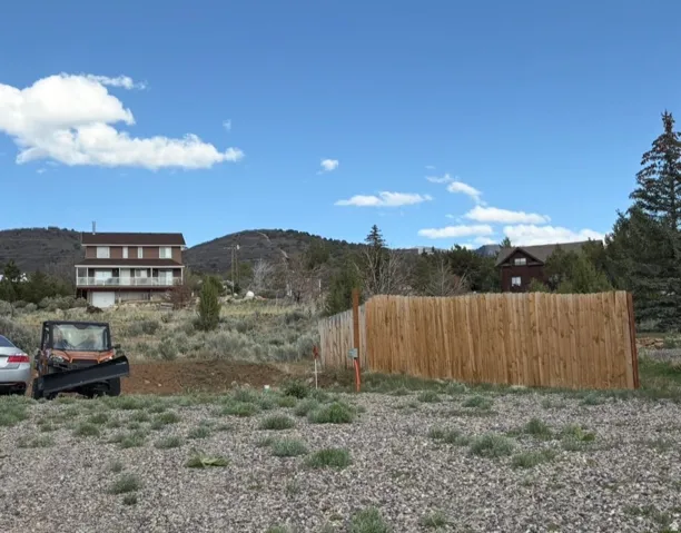 View of yard with a mountain view and a view of rural / pastoral area