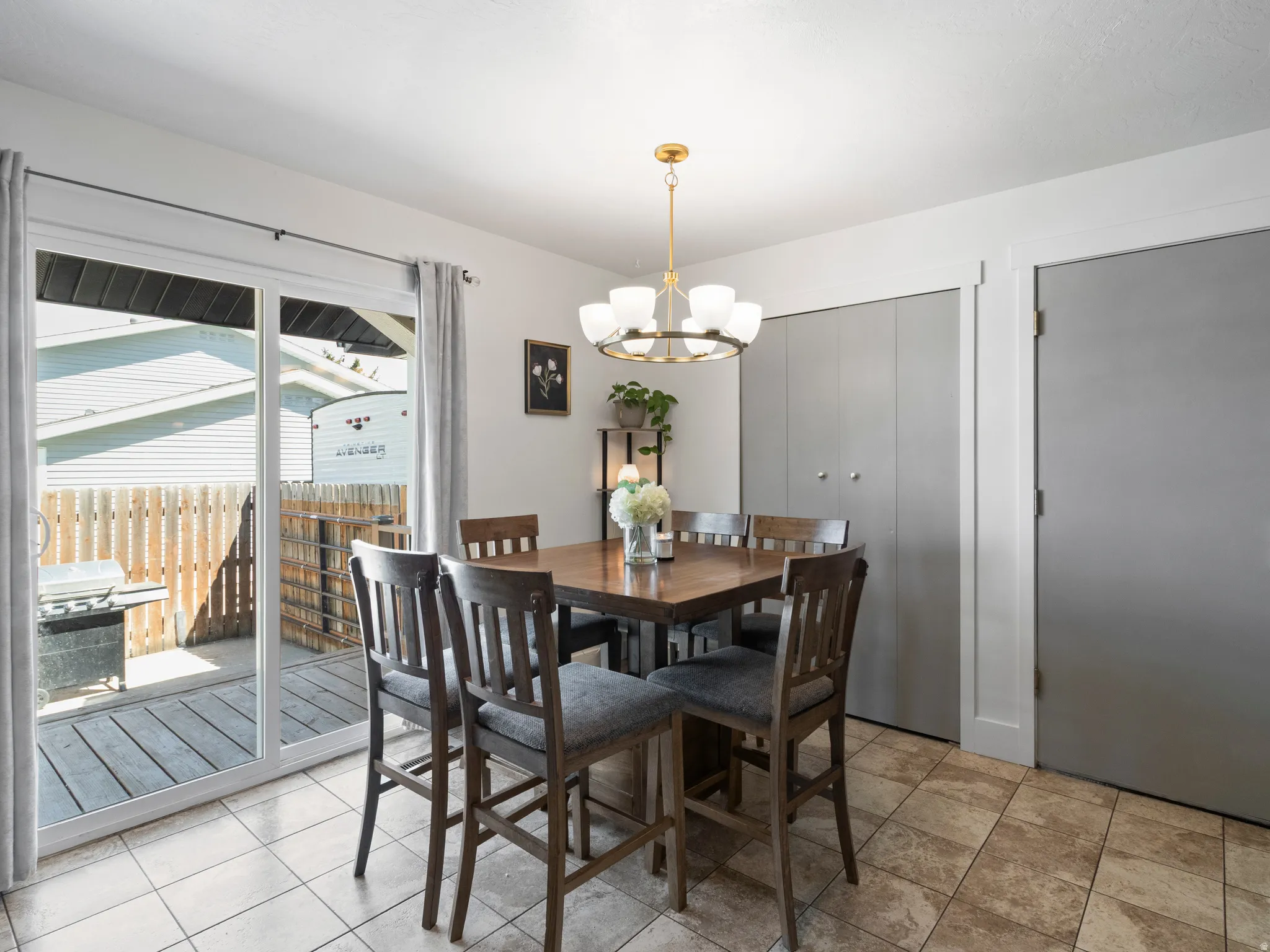 Dining area featuring hanging lights