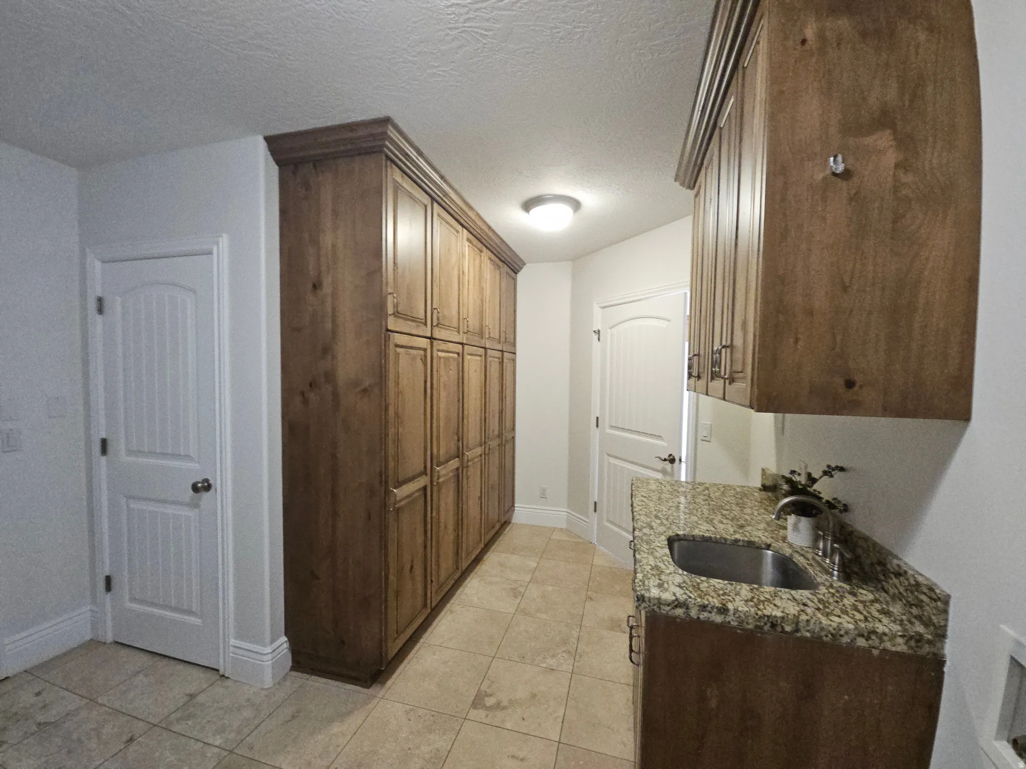 Laundry room / Mudroom off the kitchen with a 1/2 Bath