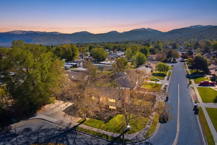Aerial view at dusk of a mountain view and a residential view