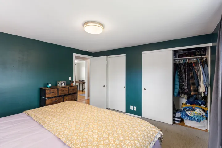 Bedroom featuring two closets