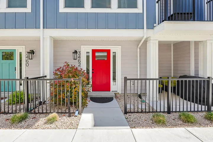 Property entrance with board and batten siding