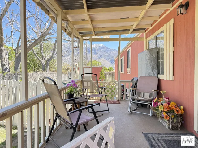 Sunroom / solarium with a mountain view