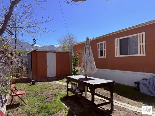 View of yard with a shed