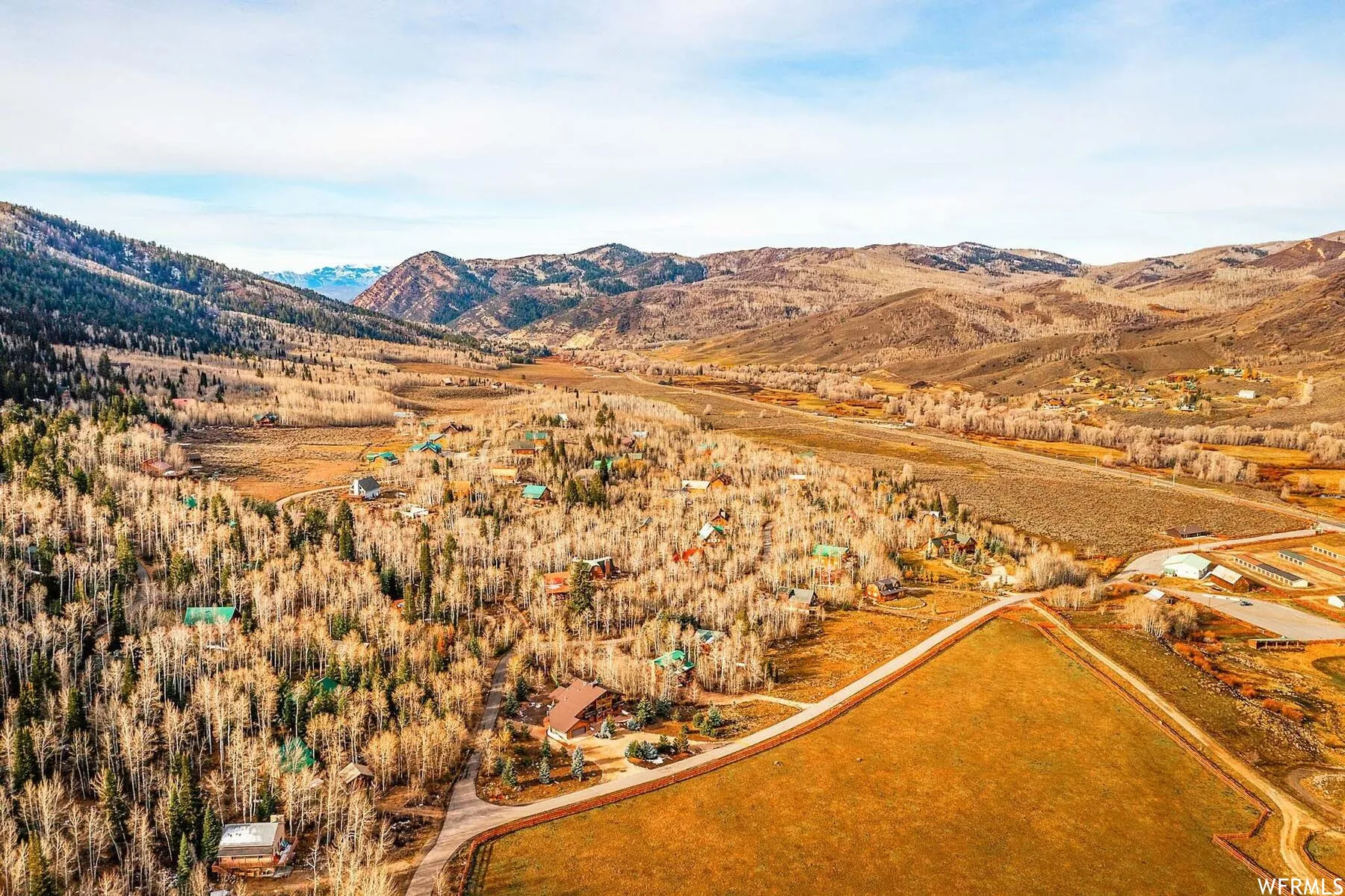 Overview of rural landscape with a mountainous background