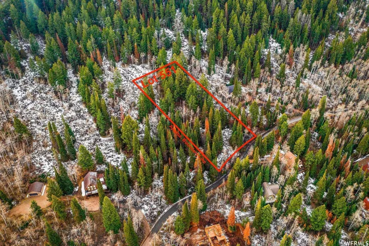 Aerial view of property's location featuring property parcel outlined