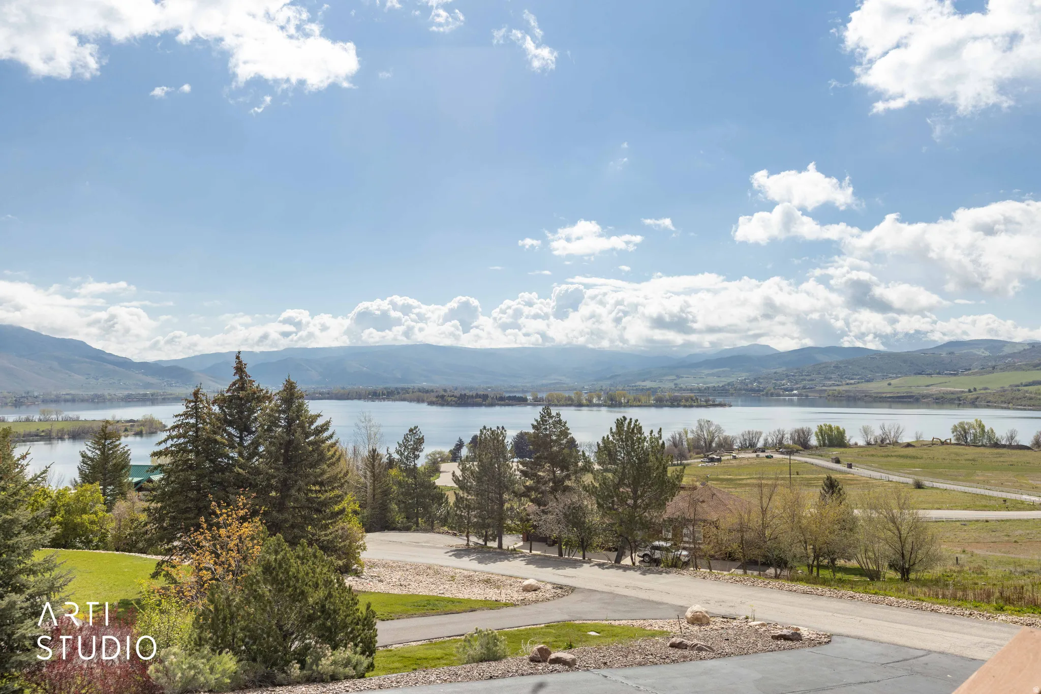 View of mountain backdrop with a nearby body of water
