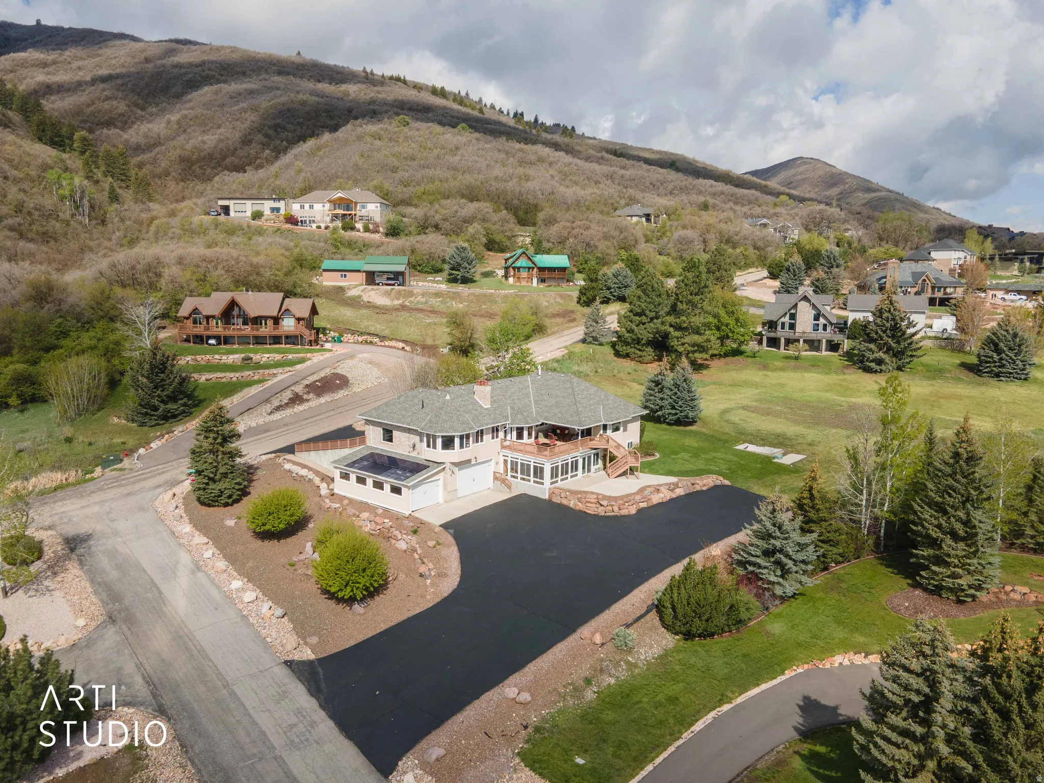 Aerial perspective of suburban area with mountains