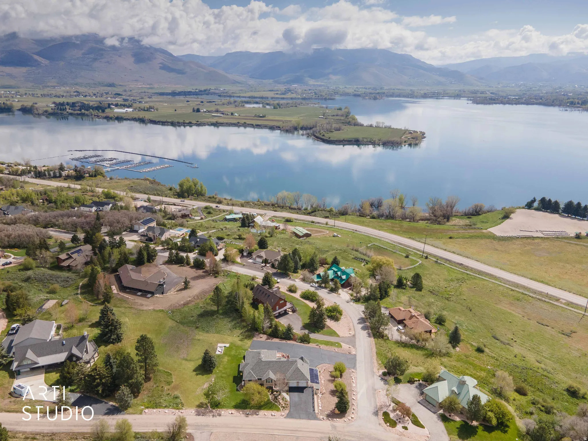 Aerial view of residential area with a water and mountain view