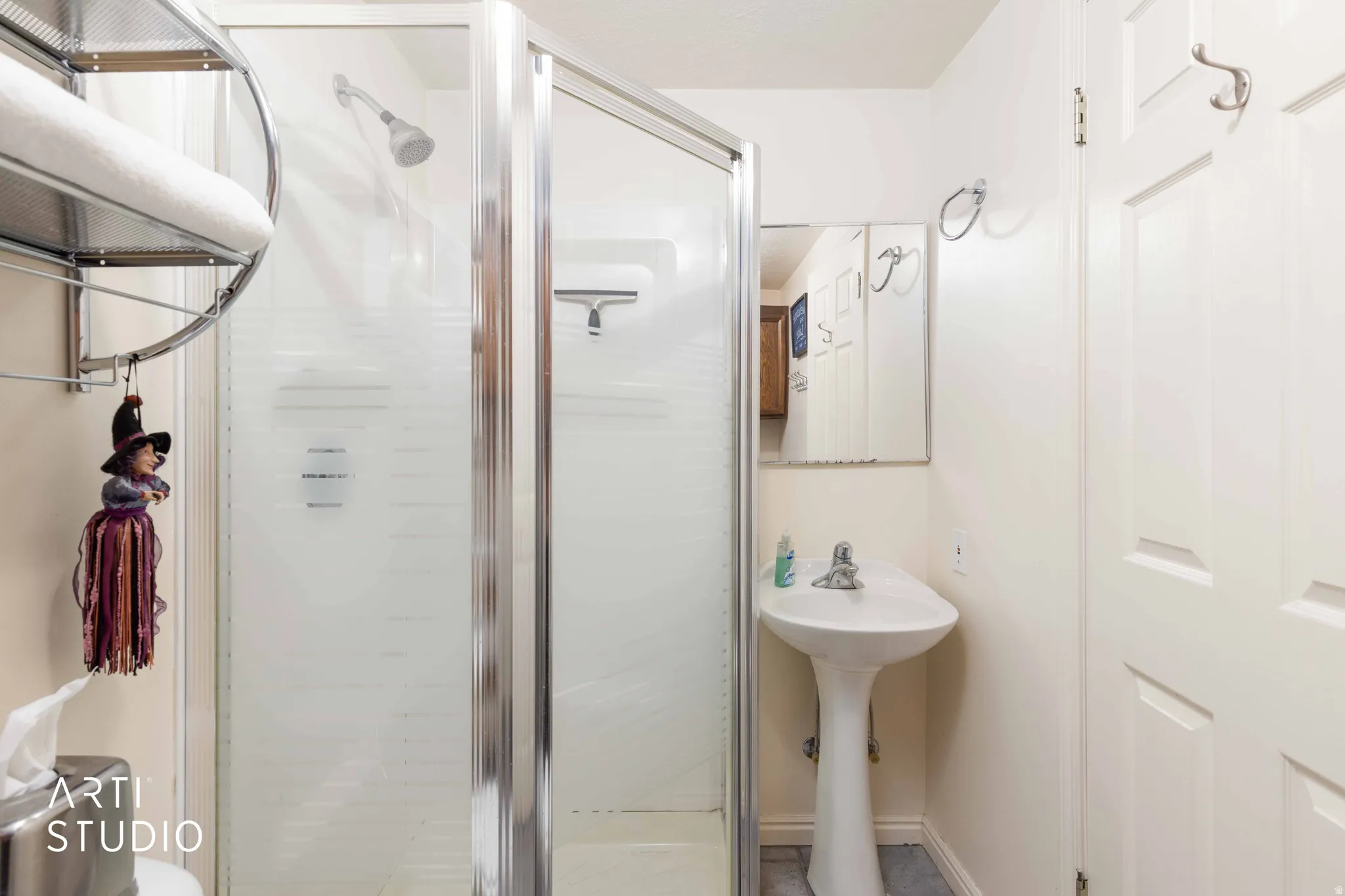 Full bath featuring a stall shower