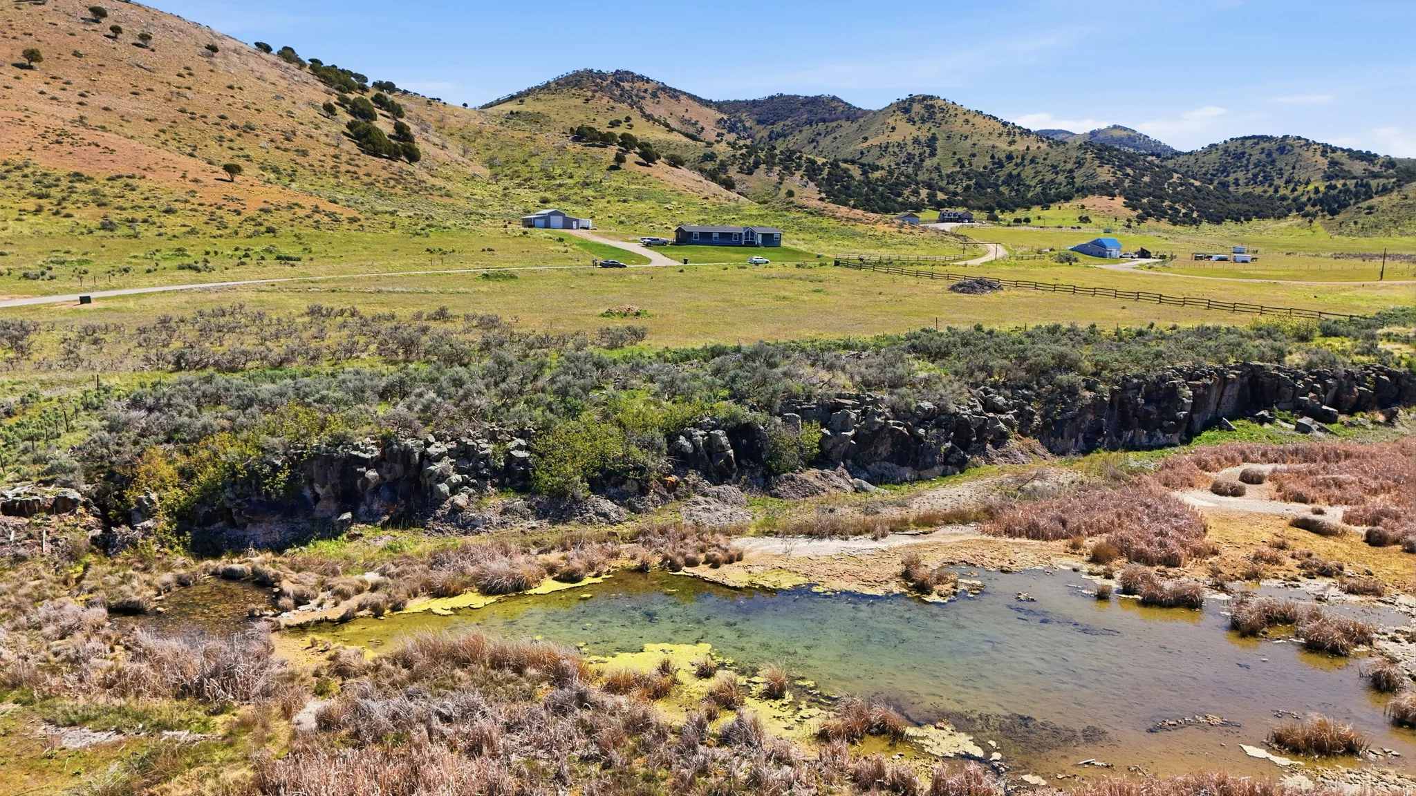 View of mountain background featuring rural landscape