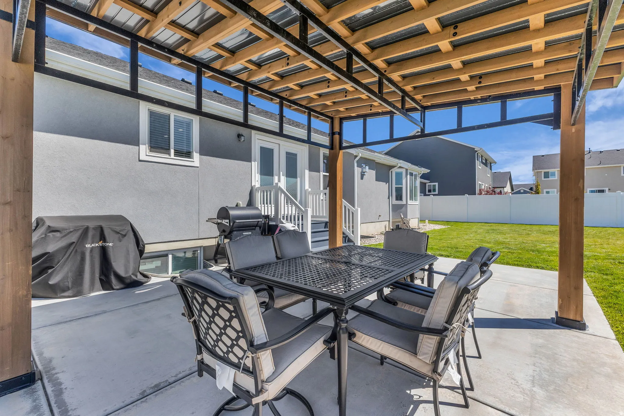 View of patio / terrace featuring outdoor dining area, area for grilling, and french doors