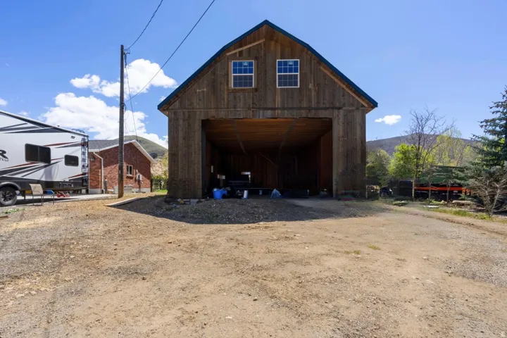 HUGE 14 foot tall garage doors with basement and upstairs