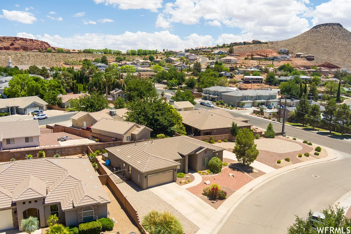 Aerial view of residential area with mountains
