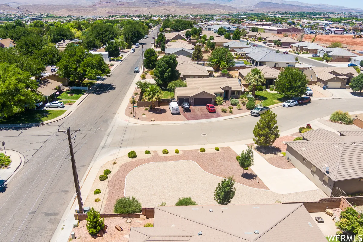 Aerial view of residential area with a mountainous background