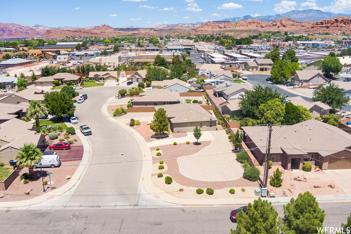 Aerial perspective of suburban area with mountains