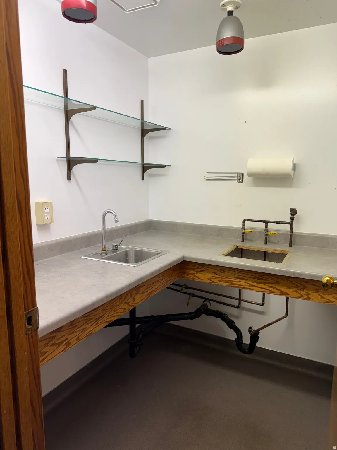 Garage featuring a sink