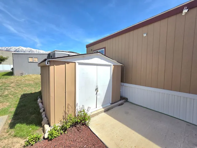 View of shed with a mountain view