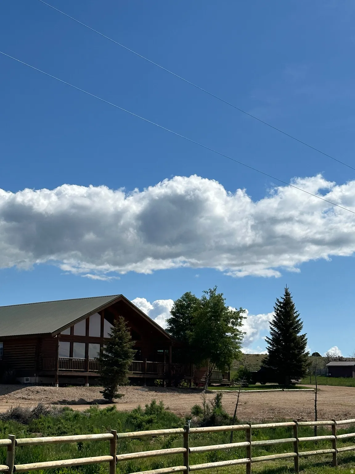 View of yard with covered porch