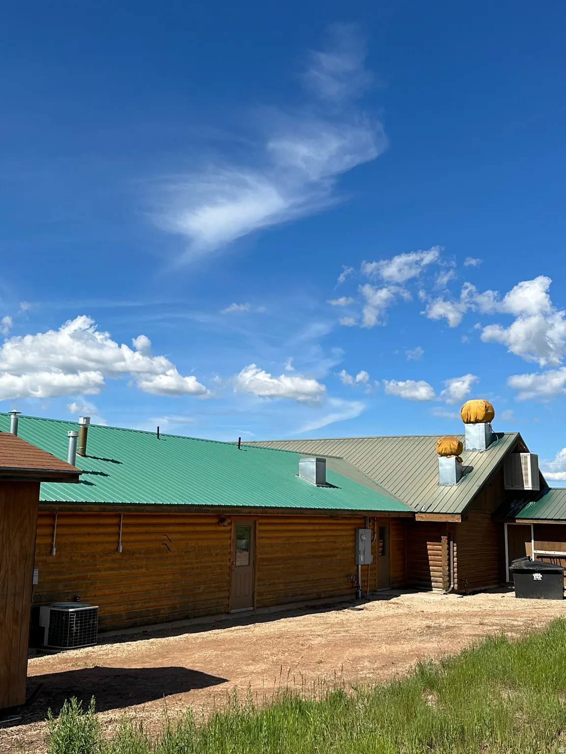 View of front of home featuring a metal roof