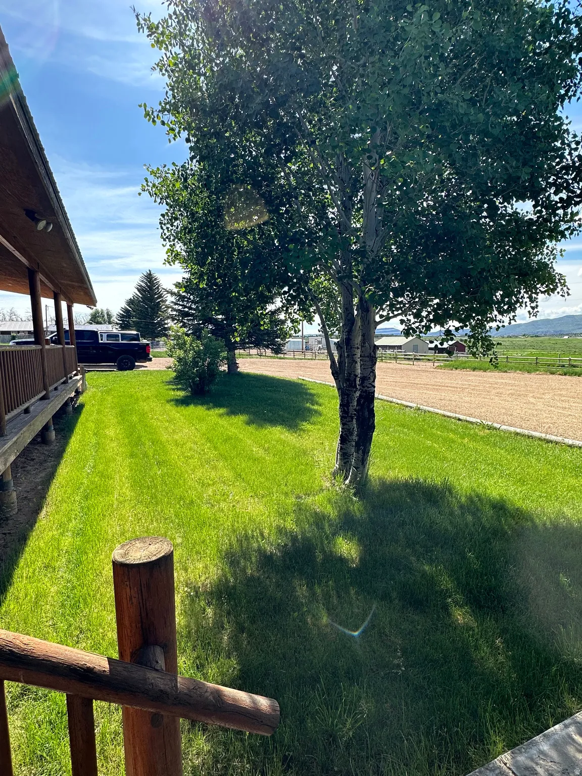View of grassy yard featuring a rural view