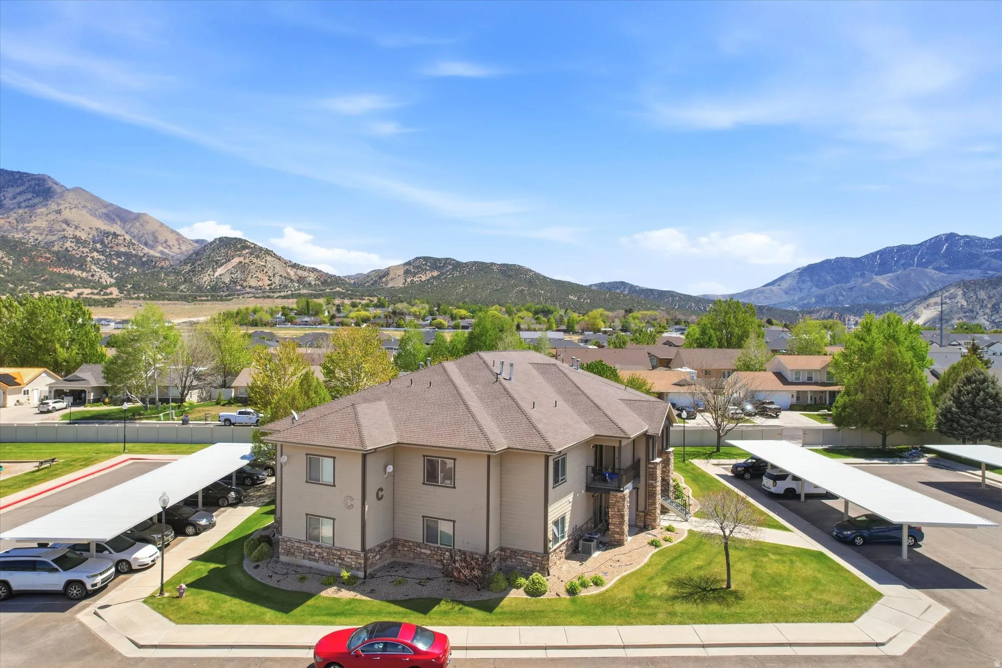 View of mountain backdrop with nearby suburban area