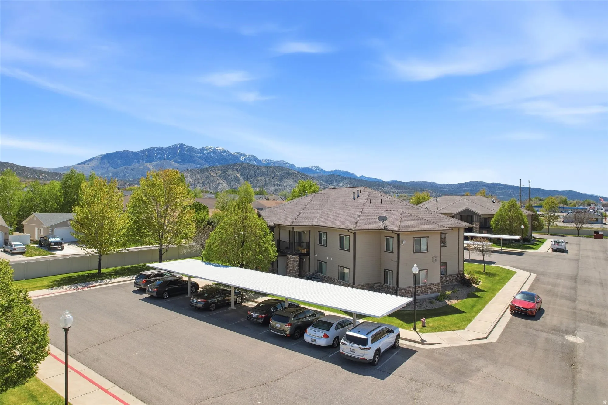 Aerial perspective of suburban area with mountains