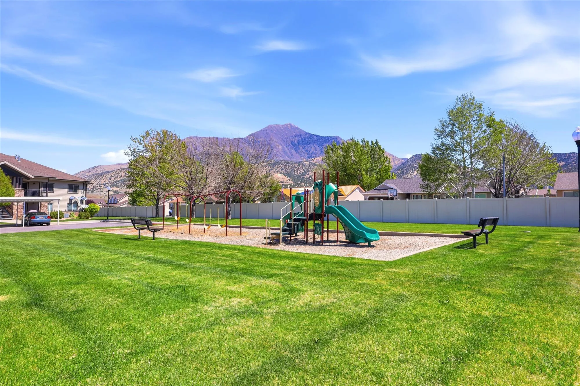 Community jungle gym featuring a mountain view