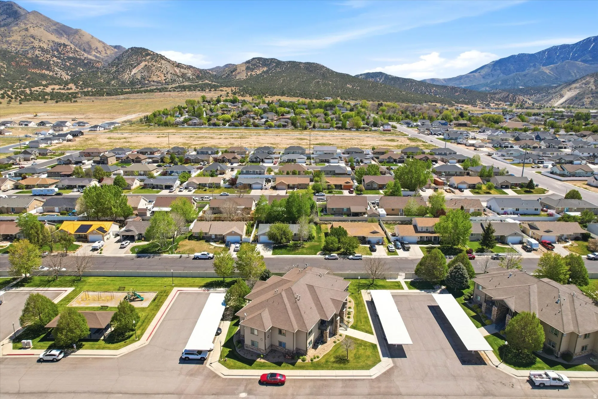 Aerial perspective of suburban area with mountains